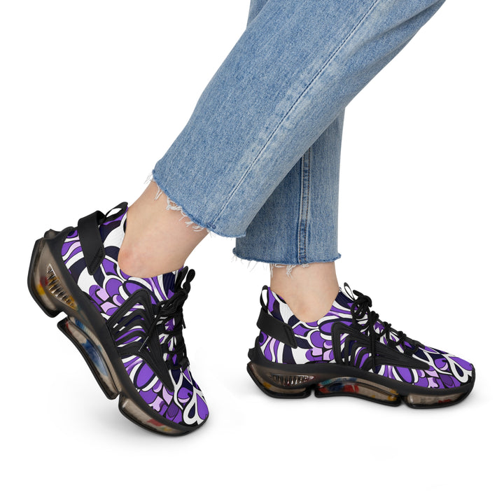 Floral Purple Abstraction Lady's Mesh Sneakers with black sole on model, side view