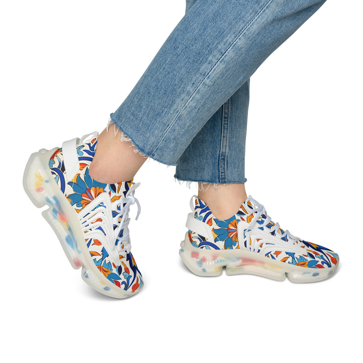 White-Orange-Blue Floral Abstraction Female Mesh Sneakers with white sole on model, side view