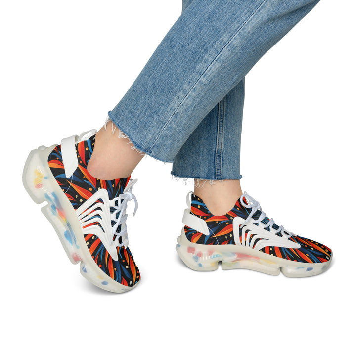 Orange-Blue & Black Floral Women's Mesh Sneakers with white sole on model, side view